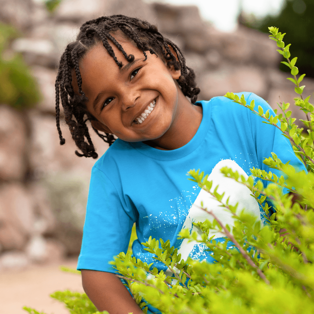 Young boy with braids in hair